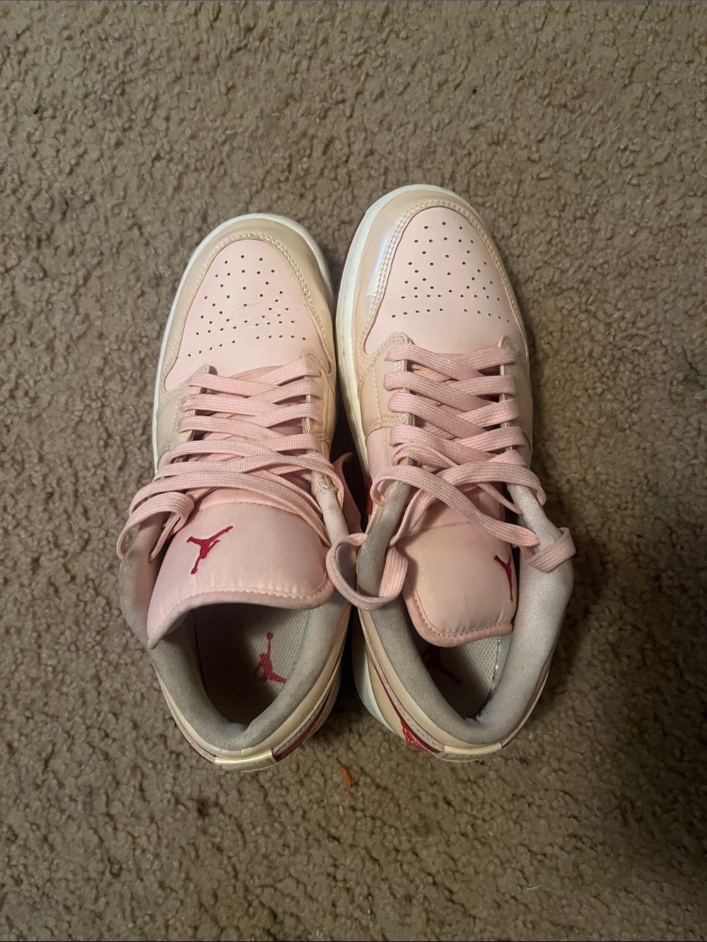 Nike Pink Low-Top Air Jordans 1’s with Red Jumpman